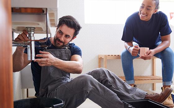 modern white kitchen cabinet in stylish interior featuring cozy seating and natural light ideal for organizing five essential items