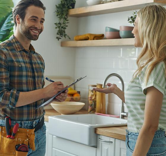 logo of FH Plumbing and Heating featuring a design that includes a flame with orange and blue colors representing plumbing and heating services