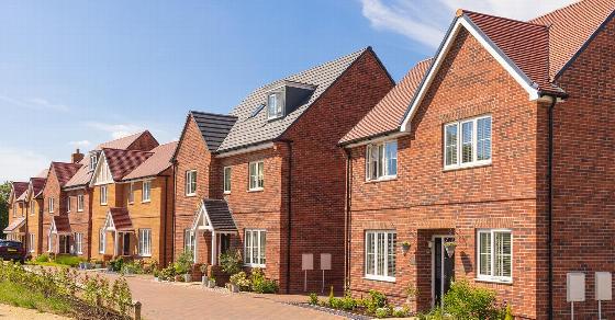 hand placing bricks for construction project 4 brick layers building strong structure