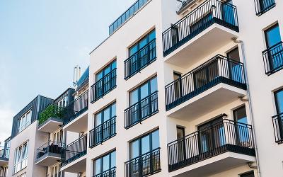 logo of FH Plumbing and Heating featuring a flame design in orange and blue colors symbolizing heat and energy for plumbing and heating services related to 3 solutions